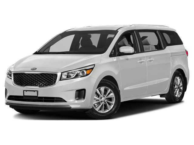 2016 Kia Sedona LX in Clear White — front three-quarter view