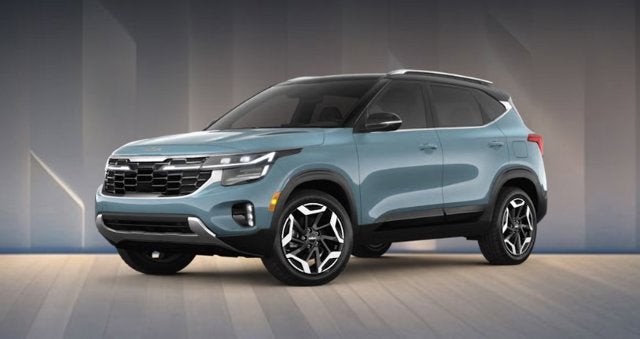 2026 Kia Seltos LX in Pluton Blue/Fusion Black — front three-quarter view